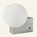 Frosted opal glass globe shade on a polished chrome rectangular block base with side-mounted brass rotary dimmer knob.