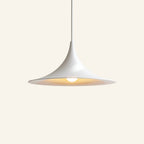 White spun-metal pendant lamp version with curved cone shade and flat brim, hung from a slim cord against a soft cream background.