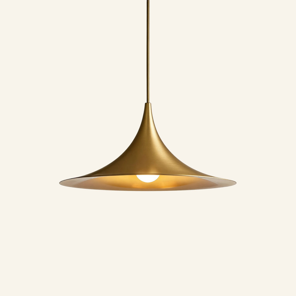 Brushed brass finish of the trumpet dome pendant, golden interior reflecting the lit bulb beneath the wide flared brim.