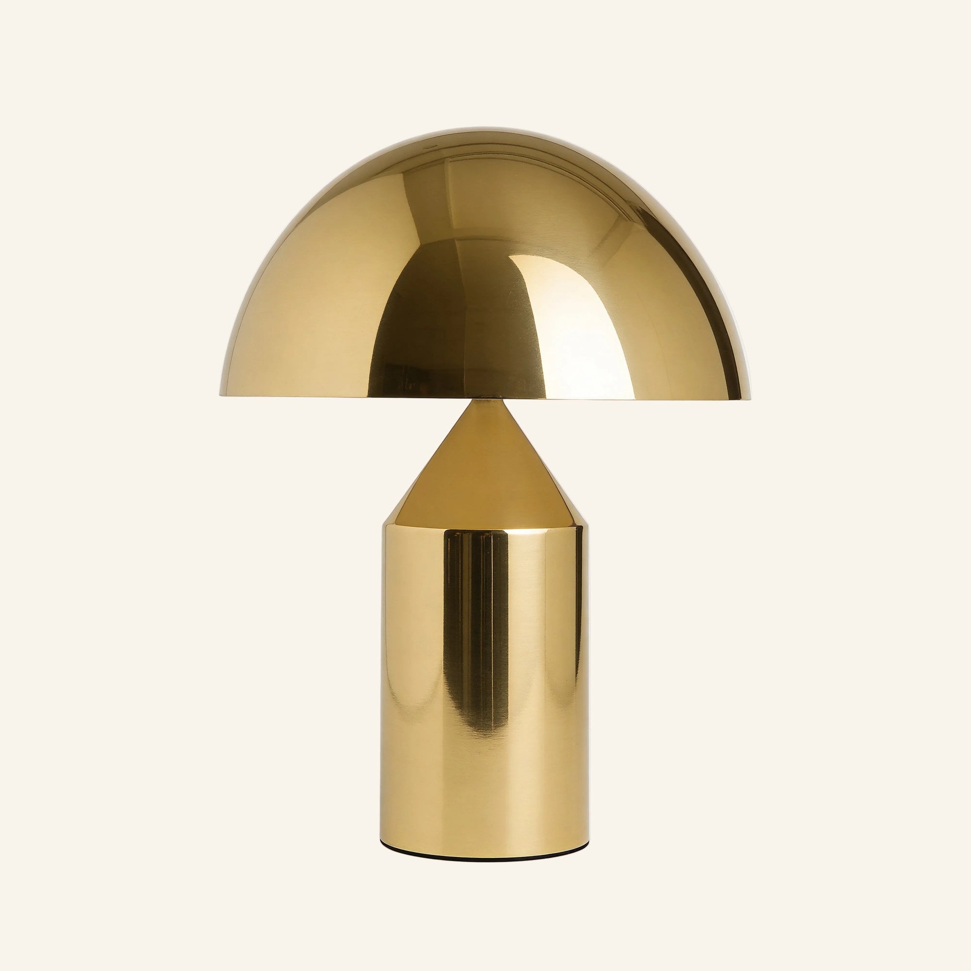 Polished brass variant of the bauhaus table lamp with mirror-finish dome and gold cylindrical body